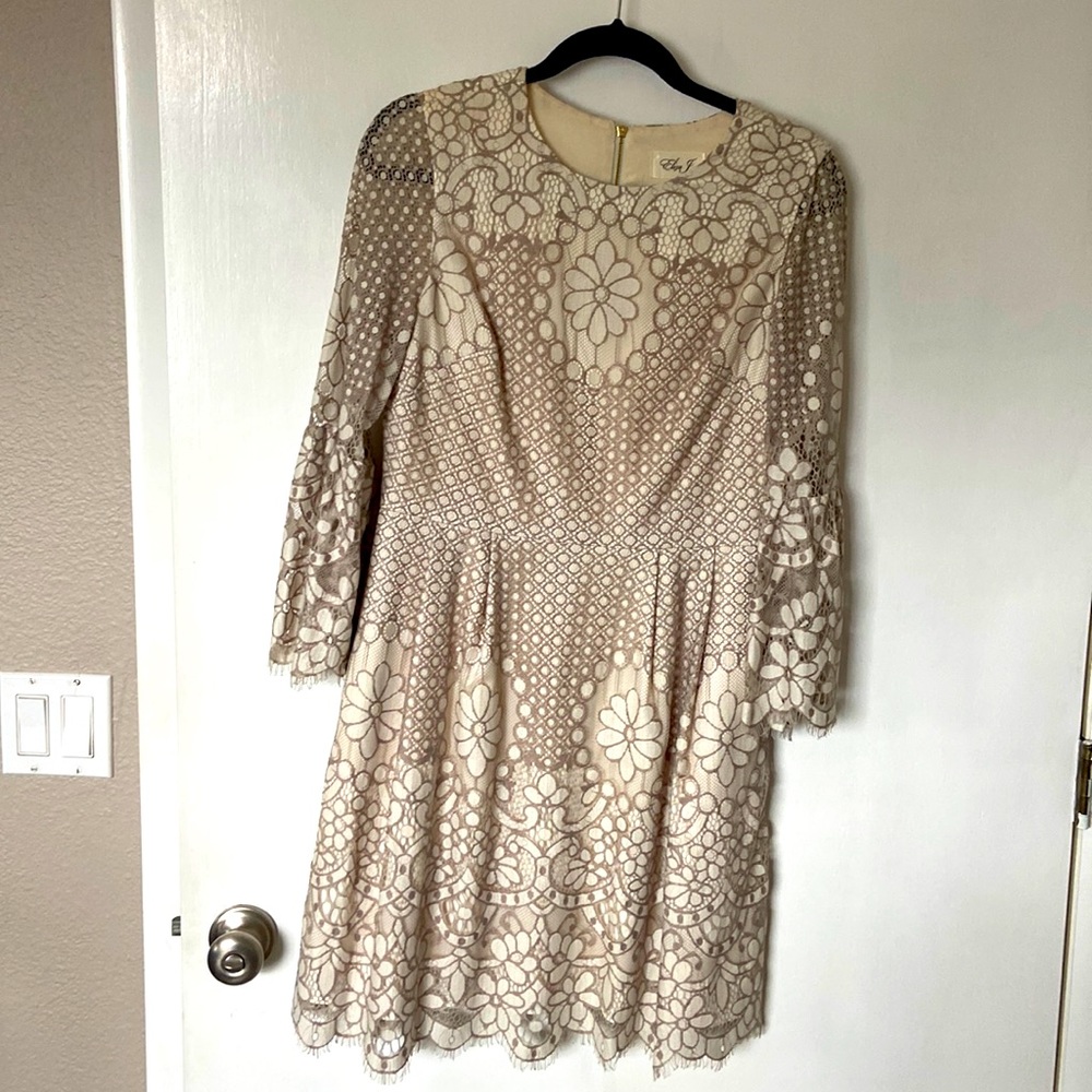 Eliza J Tan and cream lace dress. Three quarter length bell sleeves.